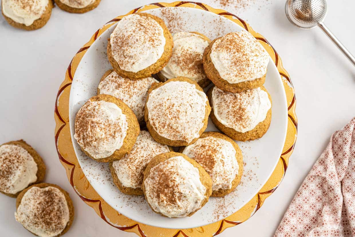 Frosted pumpkin cookies are the perfect treat, combining warm spices with a creamy, tangy topping 
