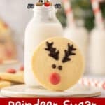 Reindeer sugar cookies beside a jar of milk.