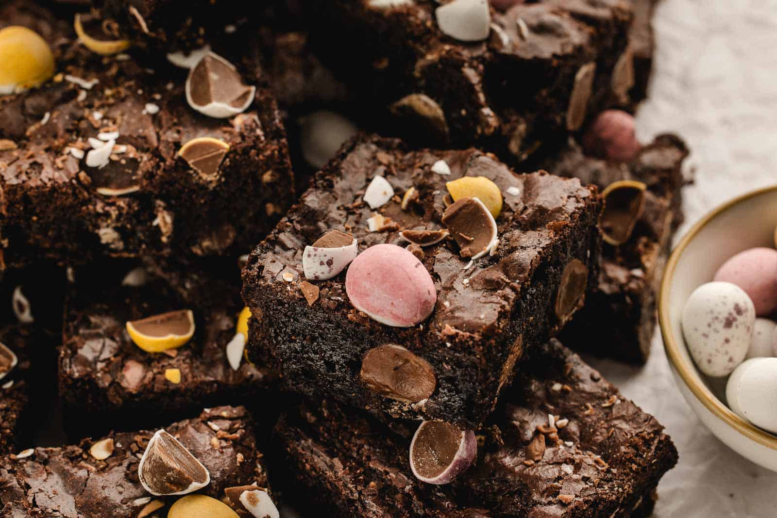 Rich, fudgy cocoa brownies topped with crunchy Cadbury mini eggs make these Easter Brownies a fun