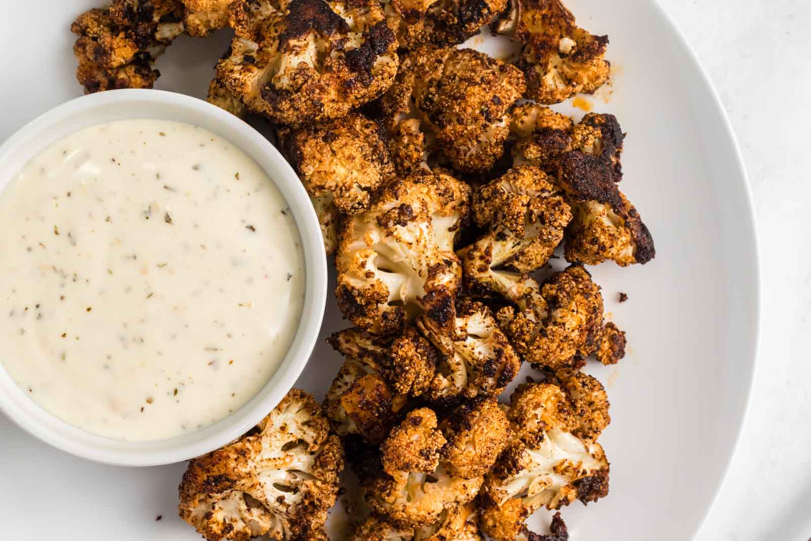 This spicy roasted cauliflower is flavored with smoky cumin and chili powder.