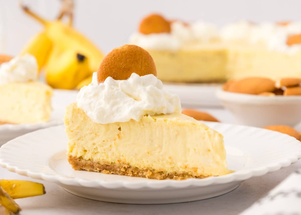 A rich and creamy Banana Pudding Cheesecake with a Nilla wafer crust that’s bursting