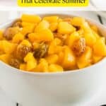 A white bowl filled with chopped peaches and raisins sits on a table. Text on the image reads, "17 Peach Desserts That Celebrate Summer.