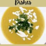 A bowl of squash soup garnished with cream and chopped herbs, featured in an image promoting "19 Squash Dishes That Go Beyond the Basics" from southernfoodandfun.com.