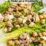 Three romaine lettuce leaves topped with a mixture of tuna, chickpeas, chopped egg, and herbs, with text reading "19 Tuna Dishes to Make on a Weeknight.