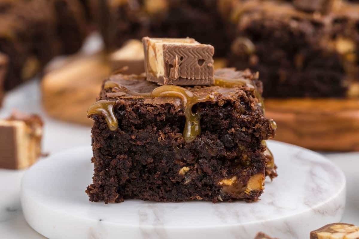 Fudgy melted-chocolate brownies packed with chopped Snickers inside and on top.