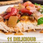 Cooked chicken breast topped with a chunky tomato and vegetable sauce on a white plate, with text overlay reading "11 Delicious Chicken Dinners.