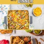 A casserole with ground beef, cheese, and vegetables in a baking dish, a bowl of shredded cheese, and a fried chicken sandwich in a basket with pickles and sauce.