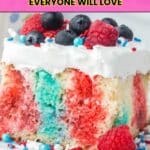 Slice of colorful poke cake topped with whipped cream, blueberries, raspberries, and sprinkles on a white plate. Text overlay reads: "14 Easy Poke Cakes Everyone Will Love.