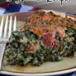 A slice of baked spinach casserole with tomatoes on a plate next to a fork, with text reading "18 Spinach Recipes.