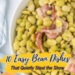 A bowl of cooked lima beans with bacon pieces, placed on a white surface next to a striped cloth napkin. Text overlay reads, "10 Easy Bean Dishes That Quietly Steal the Show.