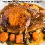 A plate with a cooked pork chop and assorted roasted vegetables, including carrots and green beans, with sauce. Text reads: "12 Dinners That Use Up a Fridge Full of Veggies.