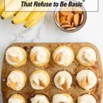 A muffin tin with twelve banana cupcakes topped with whipped cream and vanilla wafers, next to a bunch of bananas and a bowl of wafers. Text reads "13 Banana Recipes That Refuse to Be Basic.