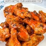 A plate of saucy chicken wings on a white plate, with text reading "13 Chicken Wings Worth Getting Your Hands Messy For" and the Southern food and fun logo.