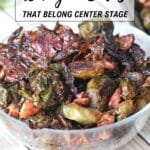 A clear glass bowl filled with roasted Brussels sprouts and chopped nuts is shown. Text above reads, "13 Vegan Sides That Belong Center Stage.