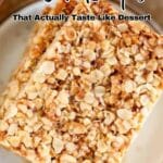 Close-up of two oat bars with almond slices on a plate. Text overlay reads, "15 Oat Recipes That Actually Taste Like Dessert." Website: southernfoodandfun.com.