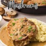 A pork chop with mushroom sauce is served alongside mashed potatoes, garnished with parsley. Sliced mushrooms and a skillet are visible in the background.