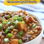Bowl of hearty stew with beans, vegetables, and green onions, promoting a list of 18 slow cooker dinners that are filling.