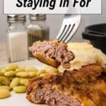 A fork holds a bite of cooked steak above a plate with steak, buttered lima beans, and mashed potatoes; salt and pepper shakers in the background. Text reads, "18 Steaks Worth Staying in For.