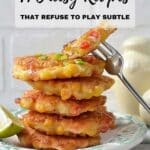 A stack of cheesy, golden fritters on a plate with a fork and a lime wedge, accompanied by text promoting cheesy recipes.
