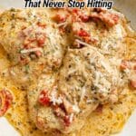 Three pieces of creamy Italian chicken with herbs, sun-dried tomatoes, and grated cheese on a white plate. Text reads "19 Italian Recipes That Never Stop Hitting.
