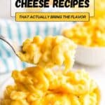 A spoonful of creamy macaroni and cheese is held above a bowl, with text overlay reading "19 Mac and Cheese Recipes That Actually Bring the Flavor.