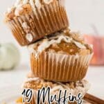 Three streusel-topped muffins with white icing are stacked on a white plate. The text reads “19 Muffins Worth Getting Out of Bed For.”.