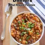 A bowl of hearty vegetable chili topped with chopped green onions sits on a wooden surface next to a spoon, with text about slow cooker dinners above.
