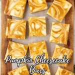 Nine pumpkin cheesecake bars with a swirled orange and cream pattern are arranged on a wooden board. Text overlay reads "Pumpkin Cheesecake Bars.