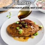 A plate with seasoned chicken breast topped with chopped green onions and brown sauce, with a bowl of salad in the background. Text overlay: "11 Budget-Friendly Dinners That Stretch Flavor, Not Cost.