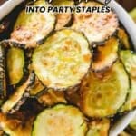 A bowl filled with crispy air-fried zucchini slices, with text overlay promoting air fryer appetizer recipes from Southern Plate.