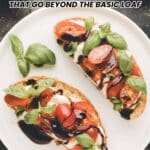 Two slices of bread topped with mozzarella, tomatoes, basil, and balsamic glaze on a white plate, with the text "14 Homemade Breads That Go Beyond the Basic Loaf.