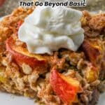A close-up of a baked oatmeal dish topped with whipped cream and peach slices, with text reading "14 Oatmeal Recipes That Go Beyond Basic.
