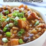 A bowl of chili topped with chopped green onions, with text overlay: "18 Chili Recipes to Warm You All the Way Through.