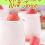 Three glass jars of strawberry mousse topped with strawberries, surrounded by extra berries, with text that reads "11 Mousse Desserts Worth Serving"โperfect for discovering new mousse recipes and dessert ideas.