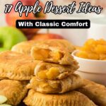 A stack of apple hand pies on a wooden board, surrounded by fresh apples and a bowl of apple filling, inviting you to discover comforting apple dessert ideas and the best apple desserts for any occasion.