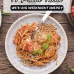 A plate of spaghetti with tomato sauce, vegetables, and herbs sits on a ceramic plate with a fork beside it; text reads "19 Pasta Ideas With Big Weeknight Energy.