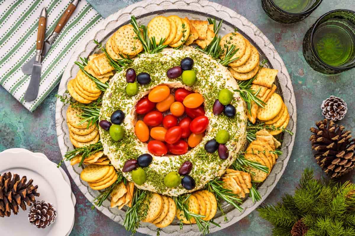 A creamy Bacon Cheese Ball Wreath with bold flavors and festive toppings—perfect for holiday.
