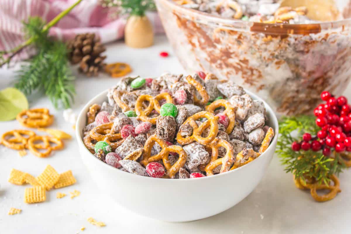 Sweet and salty Reindeer Chow with chocolate, peanut butter, and crunchy holiday favorites.