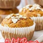 Close-up of oat muffins in paper liners with oat flakes on top; text reads "12 Oat Recipes: Showing Off What a Pantry Staple Can Do.