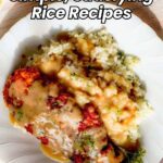 A plate of baked chicken with savory gravy served alongside fluffy white rice and herbs—perfect for a simple dinner. Discover more easy rice recipes!.
