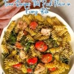 A plate of spiral pasta mixed with savory tuna, cherry tomatoes, spinach, and herbs, with a fork and napkin beside it. Text overlay promotes versatile tuna recipes.