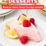 A slice of pink no-bake dessert pie topped with raspberries and lemon sits on a white plate, tempting you to satisfy your sweet cravingsโdiscover 18 irresistible no-bake desserts!.