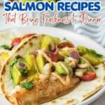 A flaky salmon fillet topped with avocado salsa and sauce, served on a tortilla. Discover 19 flavorful salmon recipes for dinner that are sure to impress!.