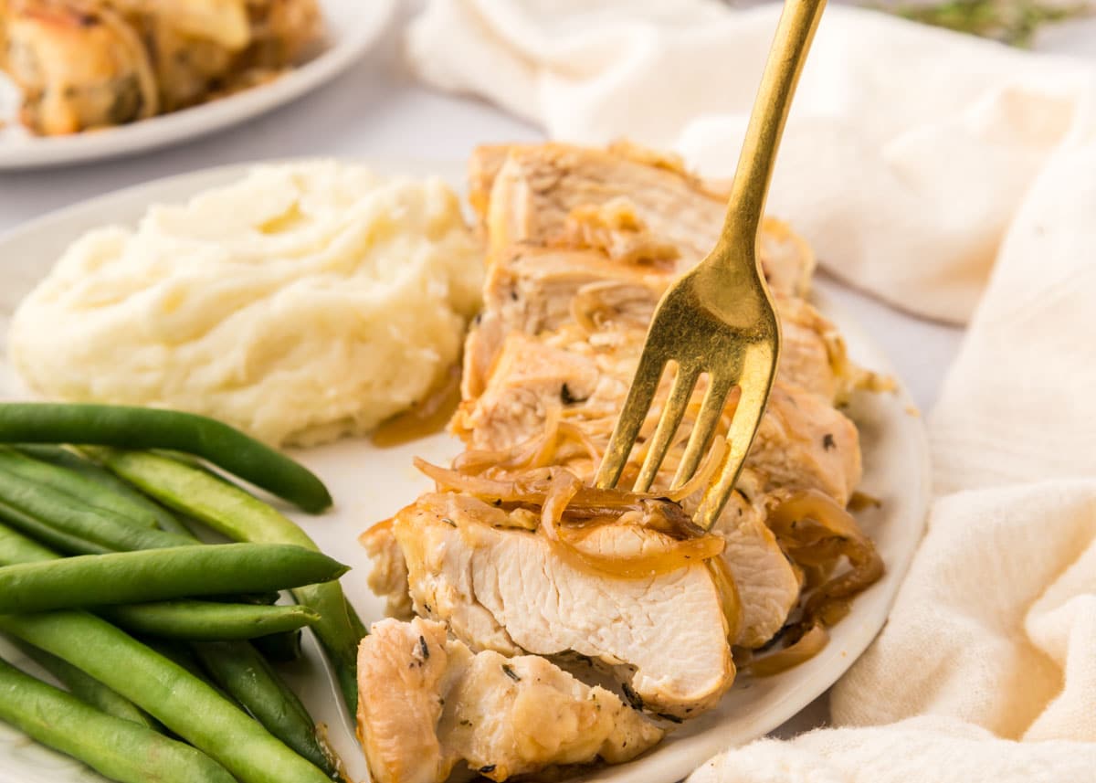 Tender chicken smothered in caramelized onions, beef broth, and melted Gruyère—