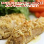 Two pieces of baked chicken with a golden, crumbly topping are served on a white plate, leafy greens and carrots blurred in the background. A text overlay highlights how mustard adds zing and depth to your cooking.