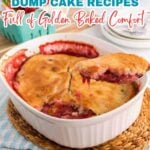 A baked strawberry cobbler in a white dish with a serving spoon, placed on a woven mat, with fresh strawberries and plates in the background—perfect for those who love classic cobbler recipes and baked comfort.