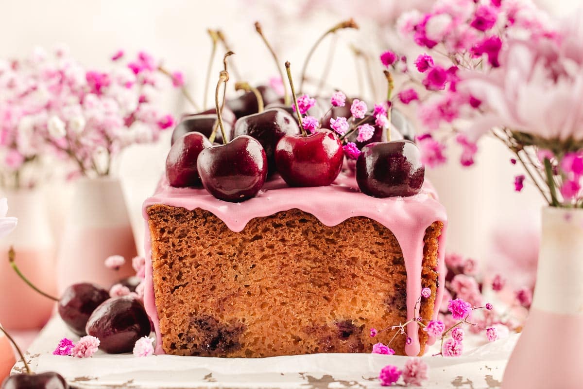 Cherry Pound Cake: moist, buttery loaf with fresh cherries and sweet glaze.
