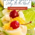 Halved pears on lettuce topped with Dukeโs mayonnaise, shredded cheese, and cherries; text overlay promoting a blog about Duke's Mayo.