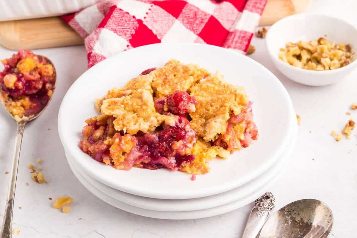 Easy five-ingredient dump cake pineapple, cherry pie filling, buttery yellow cake topping. One pan, 