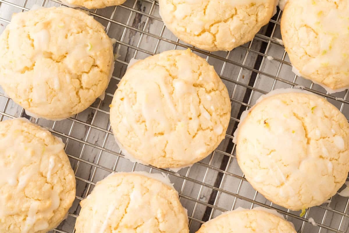 Easy lime cookies made with white cake mix, fresh lime juice, and zest, topped with a simple lime.